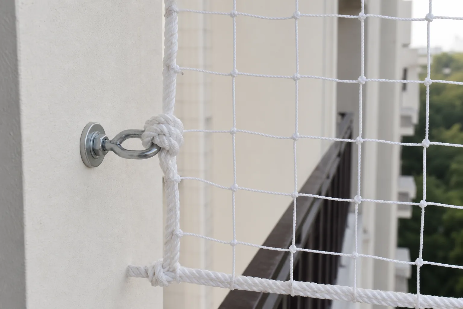 Close view of reinforced safety net anchor and rope border